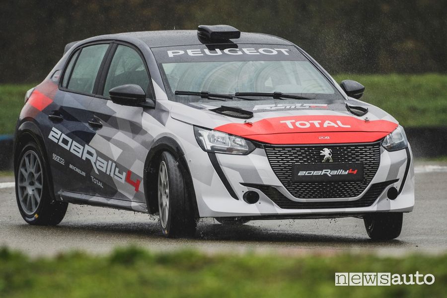 Vista anteriore, inserimento in curva Peugeot 208 Rally 4