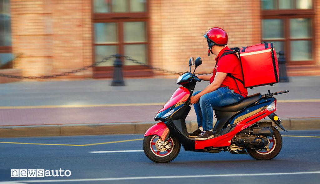 Rider food delivery in scooter