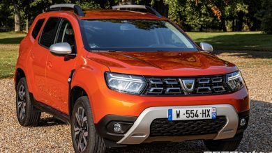 Vista di profilo nuovo Dacia Duster 4x2 Arizona Orange