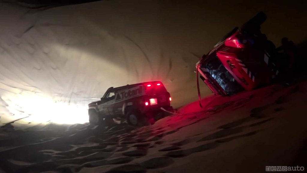 1 il Nissan Patrol legato con una fune al camion inizia la rincorsa  