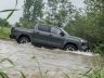 Toyota Hilux BEV in un guado