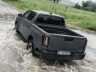 Toyota Hilux BEV in un guado