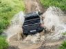 Toyota Hilux BEV in un guado